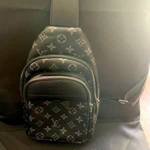 Sling bag for sale. Not authentic LV.